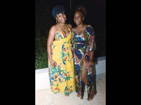 Fiona Hall (left), founder of Advenique Home Decor, and Javia Vernon rock these beautiful prints from Designs by Fiona Kimberly.