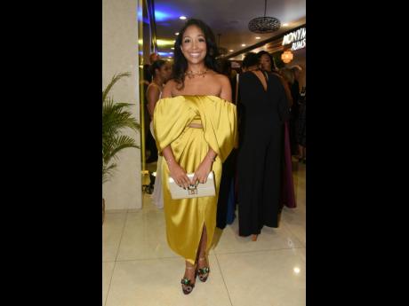 Poised to perfection, Pure National Ltd’s CEO Theresa Lindo knows that a smile is the best accessory.