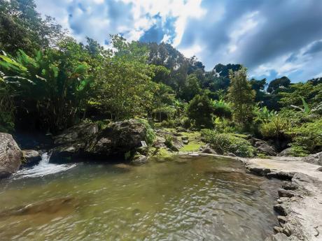 Credit: Contributed A natural river pool for recreational activities with mini waterfalls.