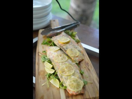  The star of the afternoon, a Scottish side of salmon, marinated with Walkerswood Green Seasoning, poached to perfection and drizzled with a rum Scotch bonnet béarnaise.