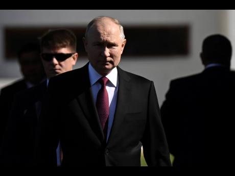 Russian President Vladimir Putin, attends a welcome ceremony with Kyrgyzstan’s President Sadyr Japarov.
