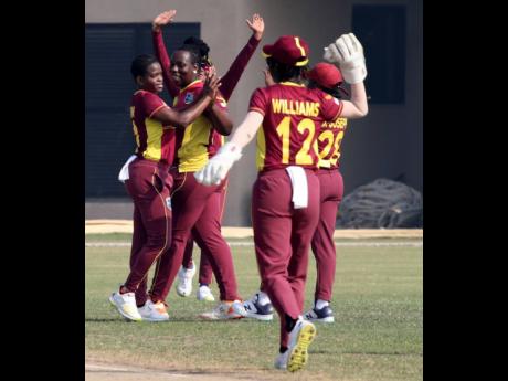 Credit: CWI Photo CWI Photo
West Indies A players celebrate a wicket against the Thailand Emerging Players during a T20 Tri-Series game at the Gaddafi Stadium in Lahore, Pakistan yesterday.