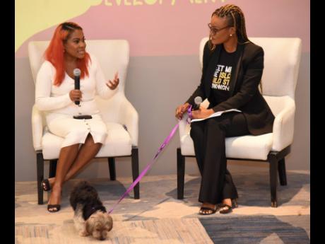 Dr Georgia Rose (left), clinical psychologist, speaks with Michelle Gordon, conceptualiser and moderator, during a Parenting on Purpose: Navigating Life’s Runway panel discussion held yesterday at the AC Marriott Hotel in St Andrew. 