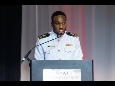 Credit: Contributed Caribbean Maritime University student Delroy Matherson speaks during the CSA’s gala about his experiences as the association’s Monica Silvera Scholarship recipient.