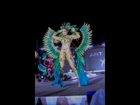 Credit: Contributed Megan embodies a masterpiece in the Art Deco costume at the Xodus Mas Couture band launch recently.