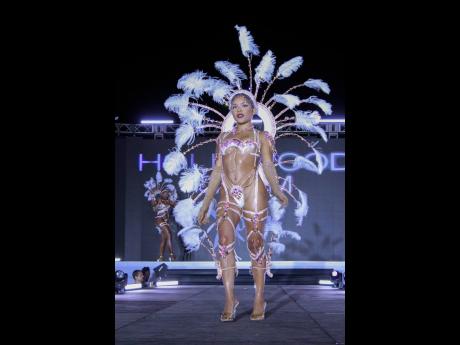 Credit: Contributed Xodus model, Deandra, rocks the Hollywood Glam costume at the recent Xodus band launch at the Ranny Williams Entertainment Centre on Hope Road.