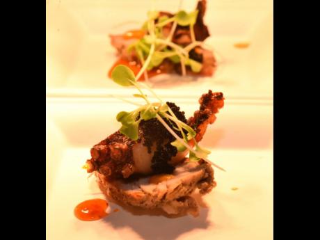 Credit: Ian Allen The not-so-secret ingredient in this sweet Scotch bonnet pork, braised octopus and caviar combination is the crEATe sauce by Chef Garfield Seivwright Jr.