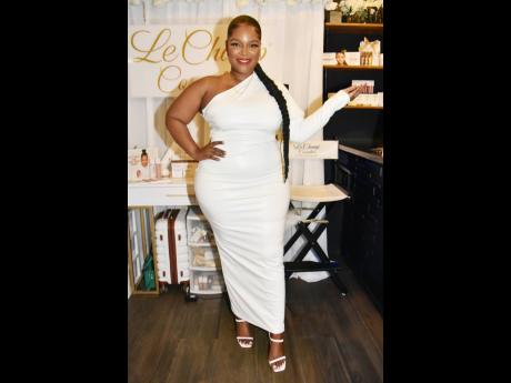 Shanique Ellington, owner of Le Champ Cosmetics, effortlessly rocks this leather dress from Fashion Nova.