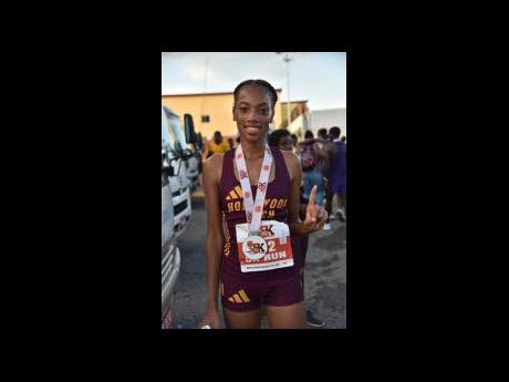 Credit: Nicholas Nunes Cindy Rose of Holmwood Technical, the top female in yesterday’s Burger King 5K in Portmore, St Catherine.