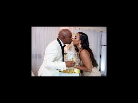 Sealing their love with a kiss, Fred and Kadeen Ellis officially become husband and wife.