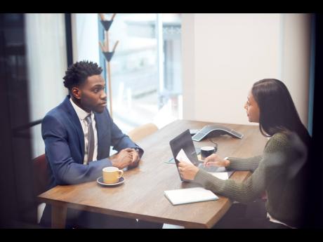 Representational image of a job interview in progress.