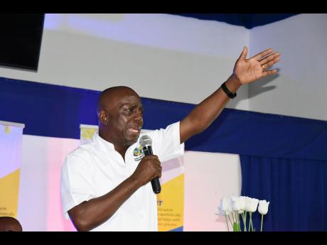 Audley Gordon, executive director of the National Solid Waste Management Authority addressing residents and stakeholders about solid waste 
concerns at a town hall meeting at the Negril Community Centre in Negril, Westmoreland.
