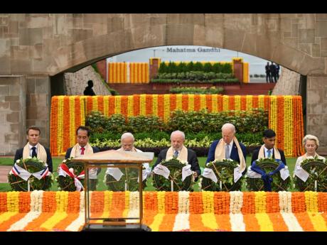 G20 leaders pay their tributes at the Rajghat, a Mahatma Gandhi memorial, in New Delhi in September. 