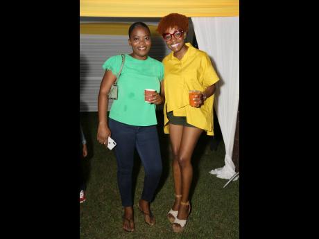Rosemarie Jackson (left), owner and chef of Cally’s Kitchen, and influencer Lamoya ‘Moya Moy’ Johnson-Mullings unite for a festive foodie photo op.