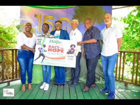 From left: Kerlyn Brown, host and producer of Inspire Jamaica; Ackeef Nugent; Carla Myrie, executive director of the Nature Preservation Foundation; Derrick Simon, Nature Preservation Foundation commercial services manager; and Alan Beckford, race manager.