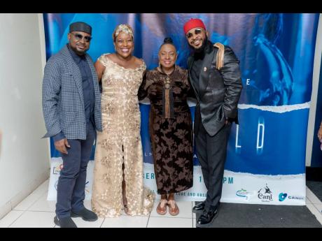 From left: Writer and director  Joel Ayuk;  Sherando Ferril, lead actress; Minister of Culture, Gender, Entertainment & Sport Olivia ‘Babsy’ Grange; and lead actor, Enyinna Nwigwe are all smiles at the recent premiere of ‘Choke Hold’ at the Carib c