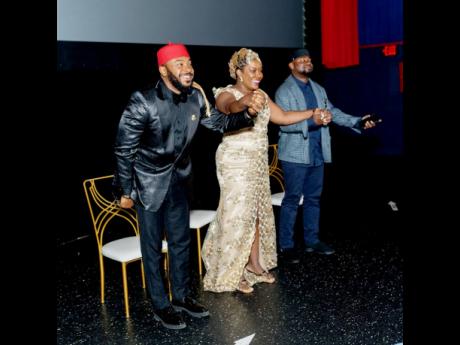 Enyinna Nwigwe (left), Sherando Ferril, and Joel Ayuk graciously accept applause at the premiere of ‘Choke Hold’.