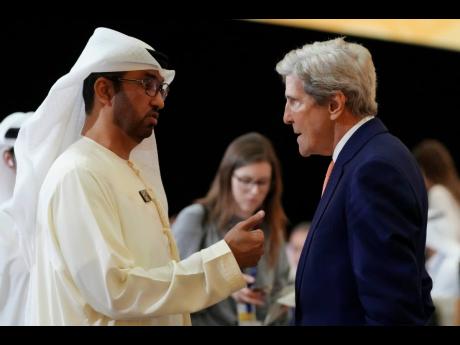 COP28 President Sultan al-Jaber (left) and John Kerry, US special presidential envoy for climate, at the COP28 UN Climate Summit.