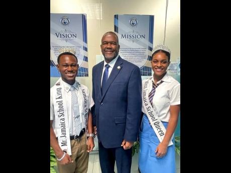 Credit: Contributed Professor Haldane Davies, president of the University of the Commonwealth Caribbean, meets the winners of the Mr & Ms Jamaica High School Competition – Adonia Palmer of St Catherine High School and Nevaeh Allen of Ardenne High School, who have received s