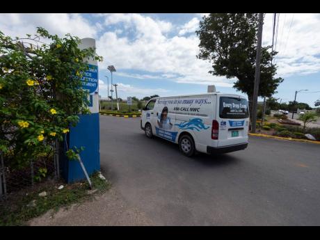 Credit: File A vehicle enters the National Water Commission’s Marescaux Road complex in Kingston, where its Collections Department is based.