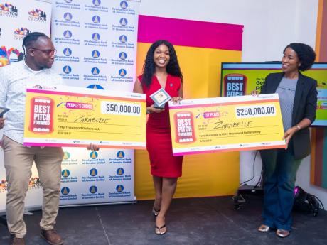 Shawneil Bailey-Gordon, founder of Zarabelle and winner of the 2023 Best Pitch Forward (centre), with her symbolic cheques and award with (from left) Dominic McDowell, project manager, Kingston Creative, and Andrea Dempster-Chung, executive director of Kin