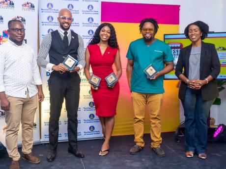 From left: Dominic McDowell, project manager, Kingston Creative, with third-place winner, Daniel T. Edwards, founder of The 180 Vision LLC “Long Story Short”, first-place winner Shawneil Bailey-Gordon, founder of Zarabelle, second-place winner  Kristof