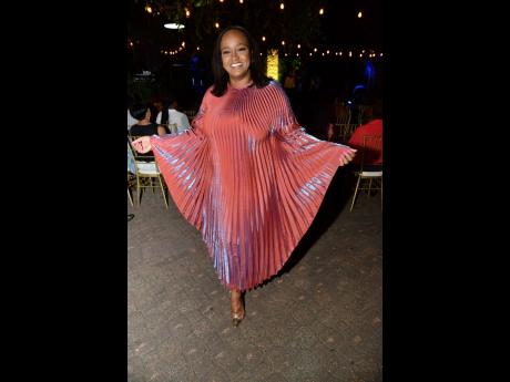Credit: Rudolph Brown Francine Fearon, risk and compliance manager, Cumax Wealth, adds her own flair to the soirée.