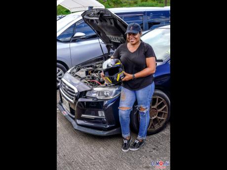 Deslie Gabriel is also proud to have been the runner-up in the ultra competitive 14-seconds class. Here, she poses beside her Subaru Levorg racecar.