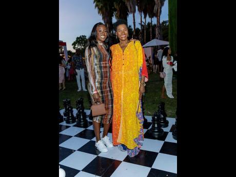 Shericka Jackson (left), Scotiabank’s brand ambassador and Jamaican Olympic sprinter, pairs up with Audrey Tugwell Henry, Scotiabank’s president and chief executive officer, for a quick photo op.
