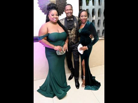 Top: Christopher Lawrence is flanked by two beauties, Charle Edwards (left) and Tashika Mitchell (right).