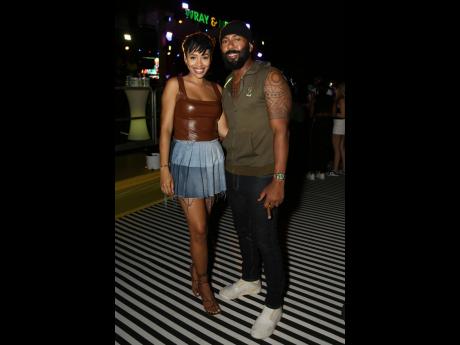 Christopher Barrett (right) and Nia Simmonds complement each other in earth tones.