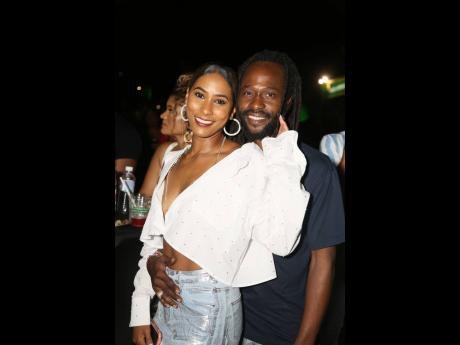 Jesse Royal (right) and girlfriend Kandi King make a kingly pair. 
