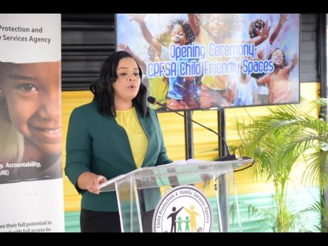 Laurette Adams-Thomas, chief executive officer of the Child Protection and Family Services Agency, addresses the recent opening of a child-friendly space at the National Children’s Registry on Carlton Crescent in St Andrew.