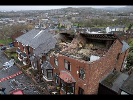 Damaged houses are seen in the Stalybridge area of Greater Manchester People after a “localised tornado” ripped off roofs and brought down walls as Storm Gerrit continued to impact the country, Manchester, England, Thursday, December 28.