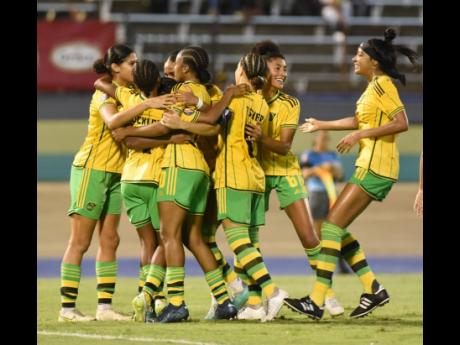 Jamaica’s Reggae Girlz celebrate a goal against Panama during a Concacaf Women’s Gold Cup qualifier  at the National Stadium.  