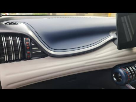 Credit: Kareem LaTouche Gym rats rejoice! The BYD Yuan Plus interior redefines sleek with weight-inspired handles and a gear shifter that feels like you’re sculpting the open road.