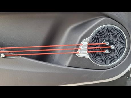 Credit: Kareem LaTouche Strings that sing and doors that pop: the BYD Yuan Plus blends musical flair with futuristic function, making every exit an entrance.