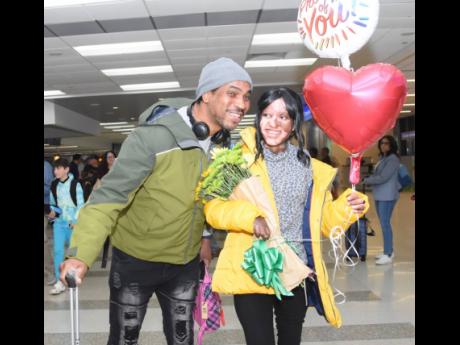 Westmoreland burn victim Adrianna Laing and her father, Adrian, arrive at the Fort Lauderdale-Hollywood International Airport in Florida after the teen was discharged from the Shriners Hospital for Children in Boston, Massachusetts, on March 28. The teenag