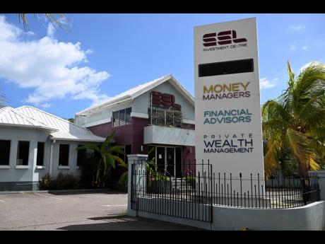 Stocks & Securities Limited’s office on Hope Road, St Andrew.