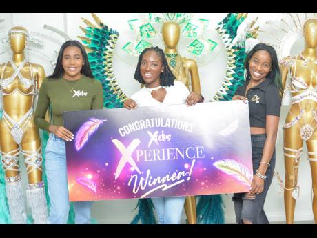 From left, Shanique Hayden, Xodus Carnival marketing manager; Philippa Smith, winner of the 12 Days of Christmas ‘Xodus Xperience’ giveaway, and  Gabrielle Waite, CEO and founder of Carnival Glam Hub, pose for the camera at the official ‘Xodus Xperie