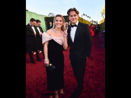 Carrying a Brandon Blackwood purse, Reese Witherspoon walked the red carpet alongside her son, Deacon Reese Phillippe.