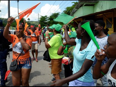 Credit: File Supporters of the PNP and the JLP are seen in this 2019 photo in Port Antonio, Portland.