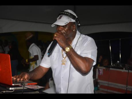 Credit: Janet Silvera Stone Love’s Wee Pow creating musical waves at the Fantasy All-White Beach Affair at Tropical Bliss in Montego Bay on Sunday.