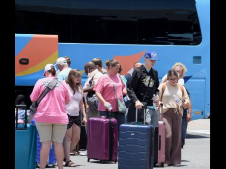 File 
In this 2022 photo, visitors are seen arriving at Sangster International Airport in Montego Bay. Janice Allen writes:  Our focus must be for the lives of our people to be improved, to move the working class to the middle class. Jamaican tourism worke