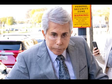 Defence lawyer David Kenner arrives at federal court for the trial of Prakazrel ‘Pras’ Michel, a member of the 1990s hip-hop group the Fugees, in an alleged campaign finance conspiracy, April 3, 2023, in Washington. Kenner pleaded guilty on January 26,