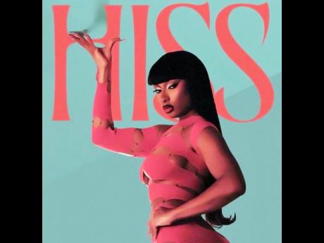 Megan Thee Stallion, styled by Zerina Akers, in a spiral cut-out tights maxi dress by RUI by Rui Zhou. 