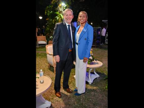 Bruce Bowen, CEO, NCB Jamaica Ltd, and wife Suzanne are all smiles as they soak up the night’s activities of ‘An Exclusive Evening with Mike’.