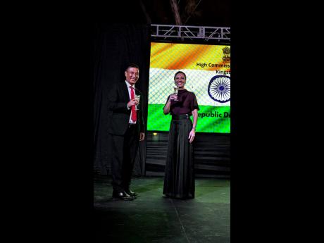 Indian High Commissioner to Jamaica  RungsungMasakui (left) shares a toast with Jamaica’s Minister of Foreign Affairs and Foreign Trade Kamina Johnson Smith.