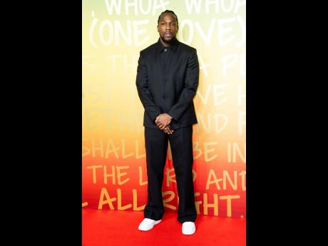 Actor Tosin Cole poses for photographers upon arrival at the premiere of the film ‘Bob Marley: One Love’ in London on Tuesday. 