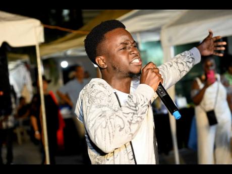 Kevoy Clarke sang his heart out at Kingston Night Market on Tuesday.